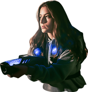 Female character aiming a troca laser gadget with blue illumination
